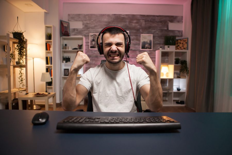 pov-young-man-excited-about-his-wining-while-playing-shooter-games-stream