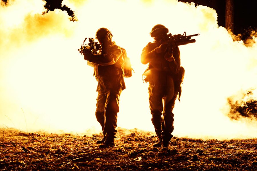 black-silhouettes-pair-soldiers-smoke-fire-burning-moving-battle-operation-back-light